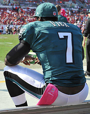 Michael Vick could be relegated to the bench in a backup role—and not necessarily with the Eagles—in 2014. (Al Messerschmidt/Getty Images)